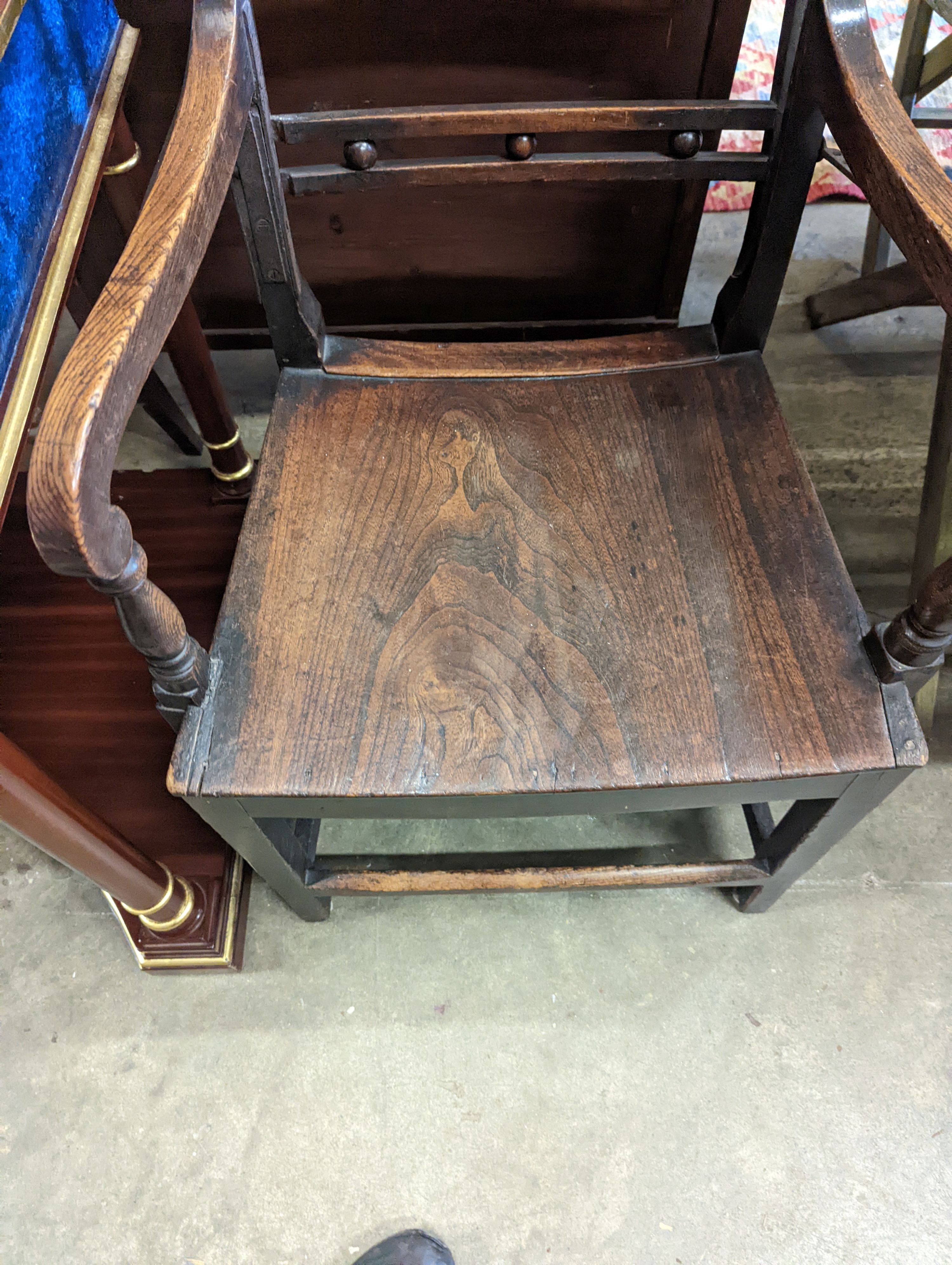 A Regency provincial ash and elm reclining wood seat elbow chair, width 54cm, depth 44cm, height 112cm